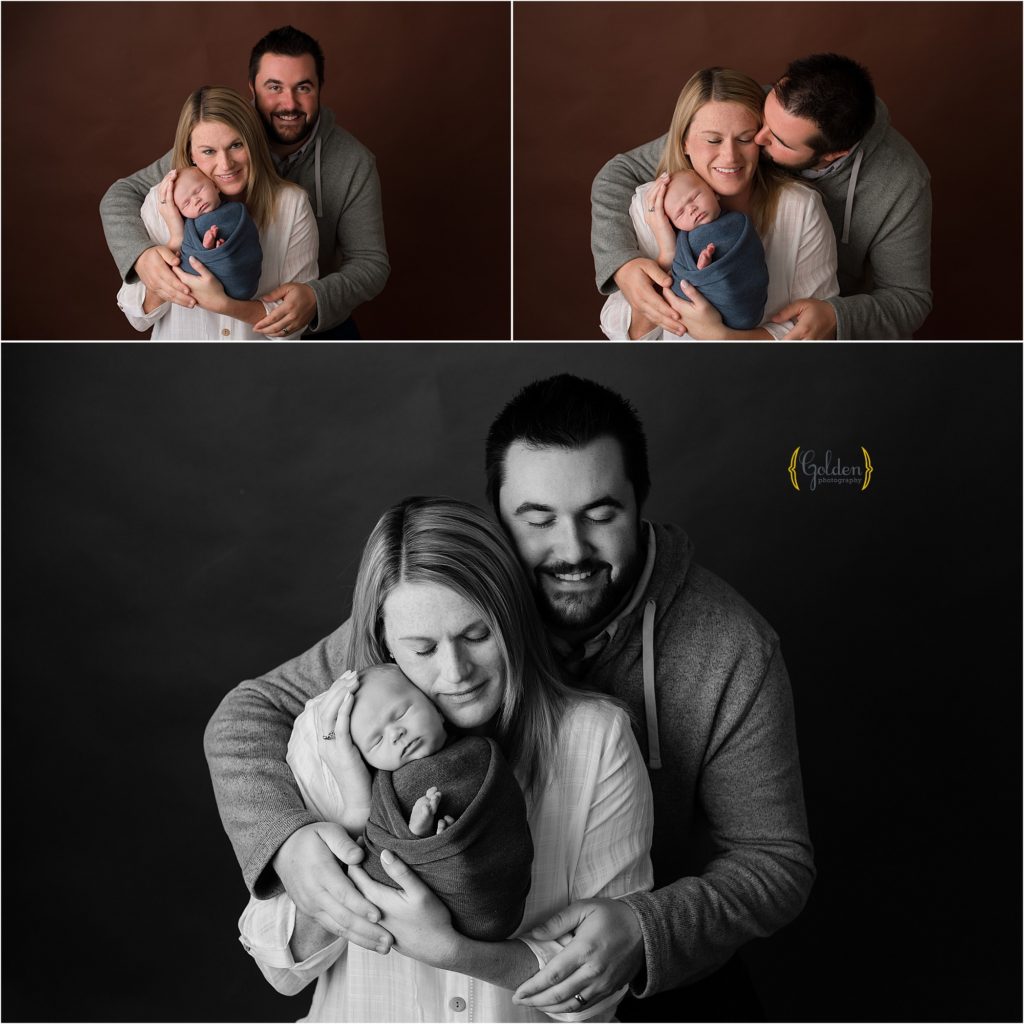 new family of three holding baby boy for family portraits