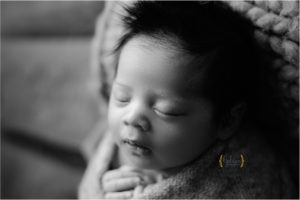 black and white of baby sleeping