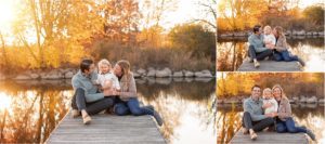 family sitting on a Barrington dock during family photography
