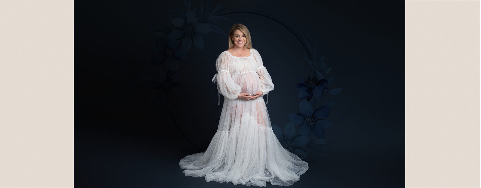 pregnant girl wearing white dress in Chicago photography studio